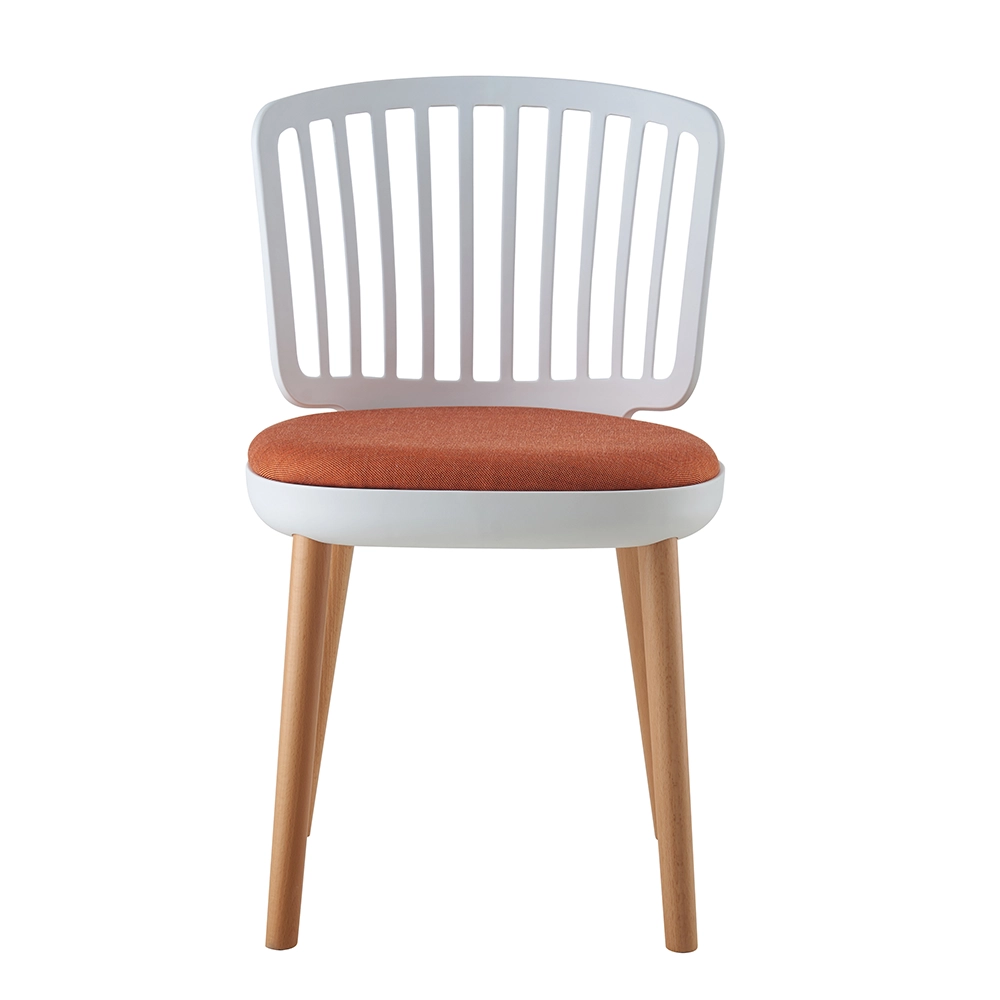Dining chair with plastic backrest and wood legs